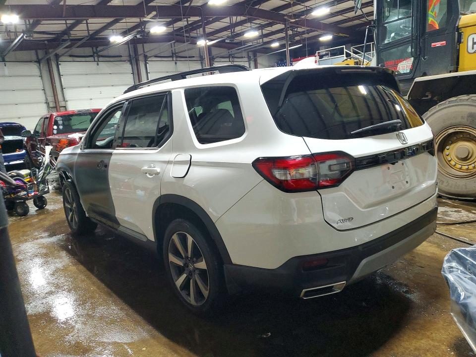 Photo 2 from auction – 2023 HONDA PILOT TOUR with VIN 5FNYG1H73PB053003