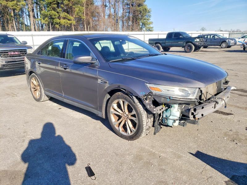 Photo 4 from auction – 2013 FORD TAURUS SEL with VIN 1FAHP2E87DG174014