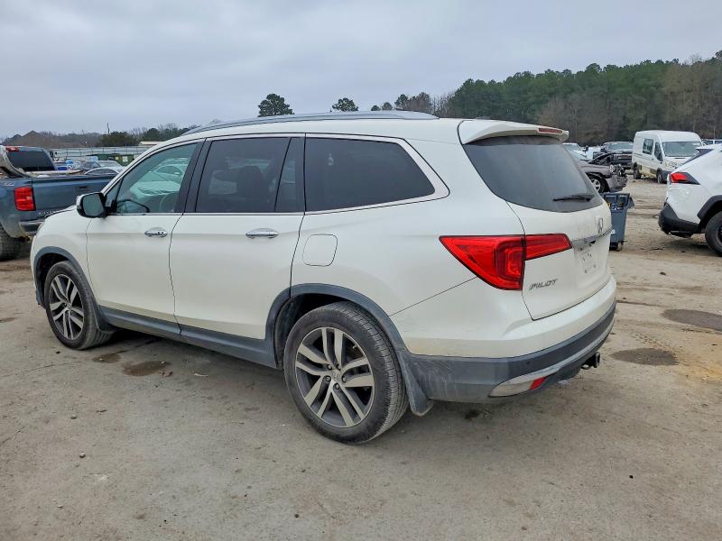 Photo 2 from auction – 2016 HONDA PILOT TOUR with VIN 5FNYF5H93GB019090