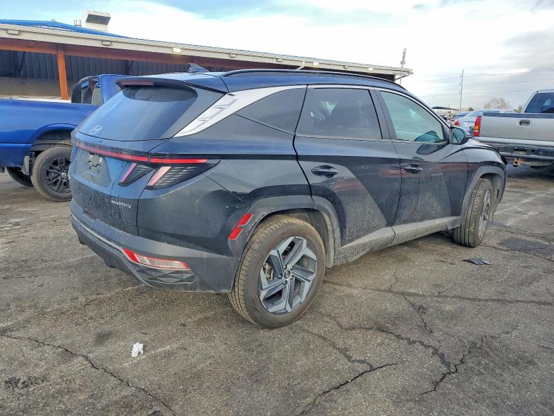 Photo 3 from auction – 2022 HYUNDAI TUCSON SEL with VIN KM8JFCA12NU011458