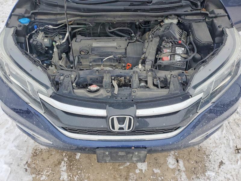 Photo 12 from auction – 2015 HONDA CR-V EX with VIN 2HKRM4H59FH107952