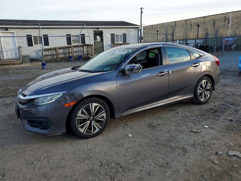 HONDA CIVIC 2017 with VIN 2HGFC1F79HH649879 - Photo from auction