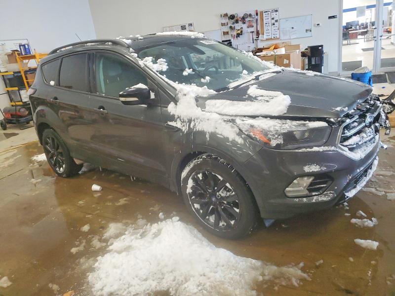 Photo 4 from auction – 2017 FORD ESCAPE with VIN 1FMCU9J96HUE77485