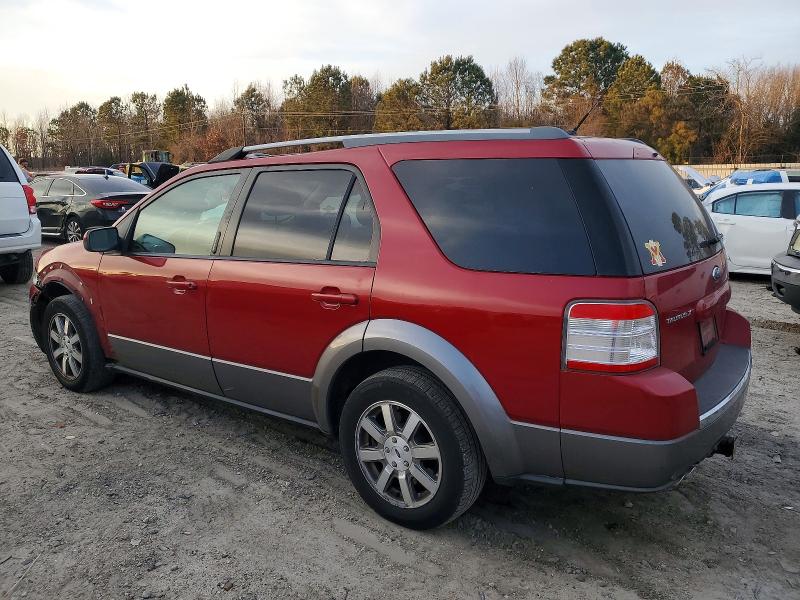 Photo 2 from auction – 2009 FORD TAURUS X S with VIN 1FMDK02W99GA00186