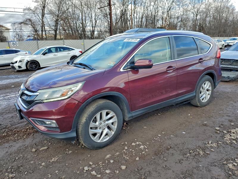 Photo 1 from auction – 2015 HONDA CR-V EXL with VIN 2HKRM4H72FH668141
