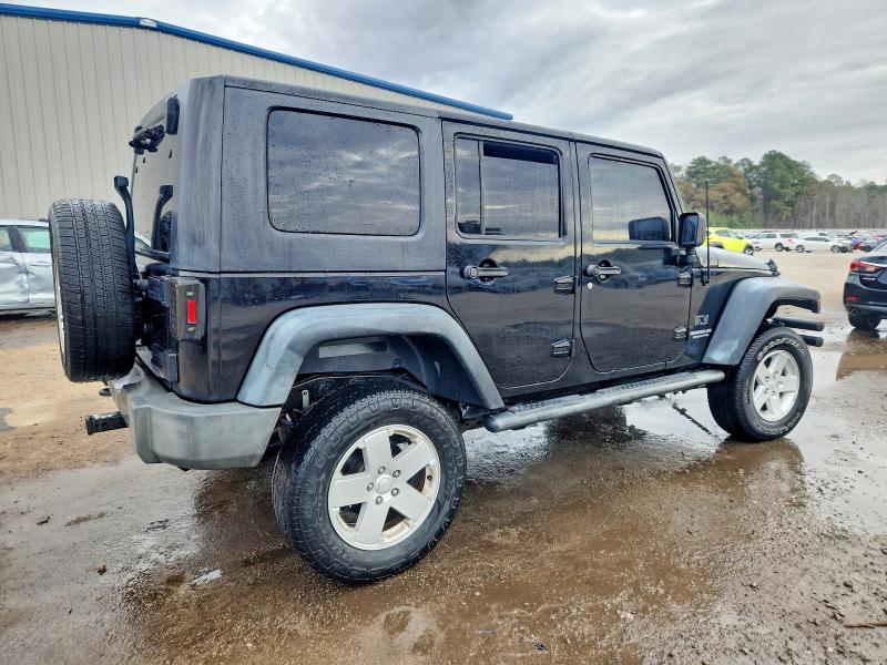 Photo 3 from auction – 2009 JEEP WRANGLER U with VIN 1J4GA39159L752503