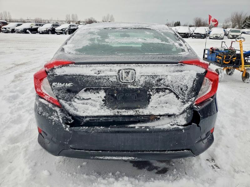 Photo 6 from auction – 2016 HONDA CIVIC LX with VIN 2HGFC2E56GH040561