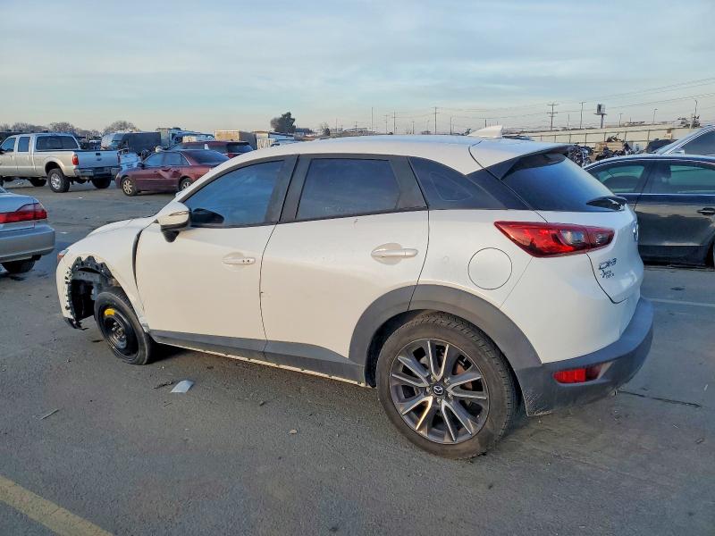 Photo 2 from auction – 2018 MAZDA CX-3 TOURI with VIN JM1DKDC74J0307653