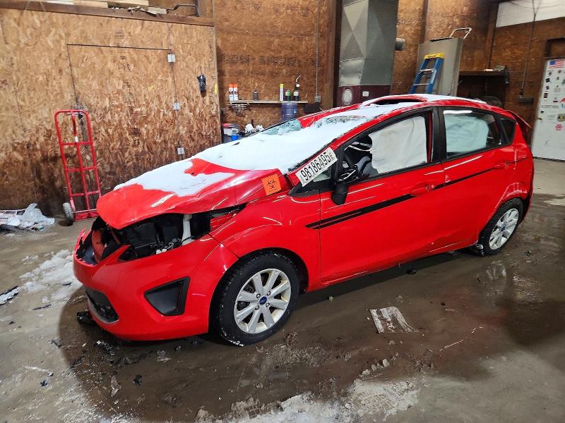 FORD FIESTA SE 2012 with VIN 3FADP4EJXCM128484 - Photo from auction