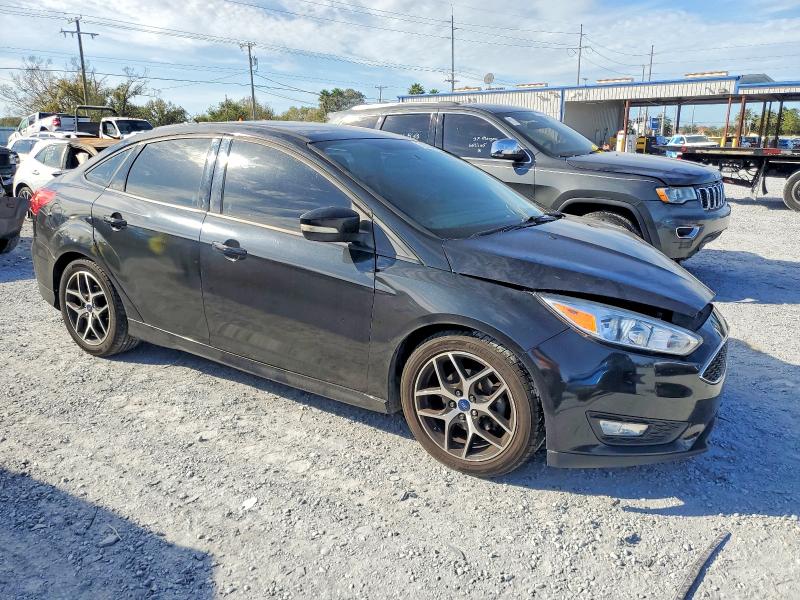 Photo 4 from auction – 2015 FORD FOCUS with VIN 1FADP3F27FL273263