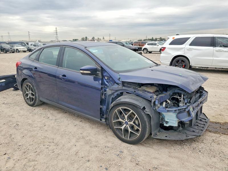 Photo 4 from auction – 2017 FORD FOCUS SEL with VIN 1FADP3H22HL344238