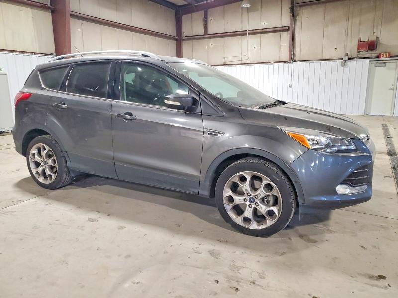 Photo 4 from auction – 2016 FORD ESCAPE TIT with VIN 1FMCU9J90GUA36529