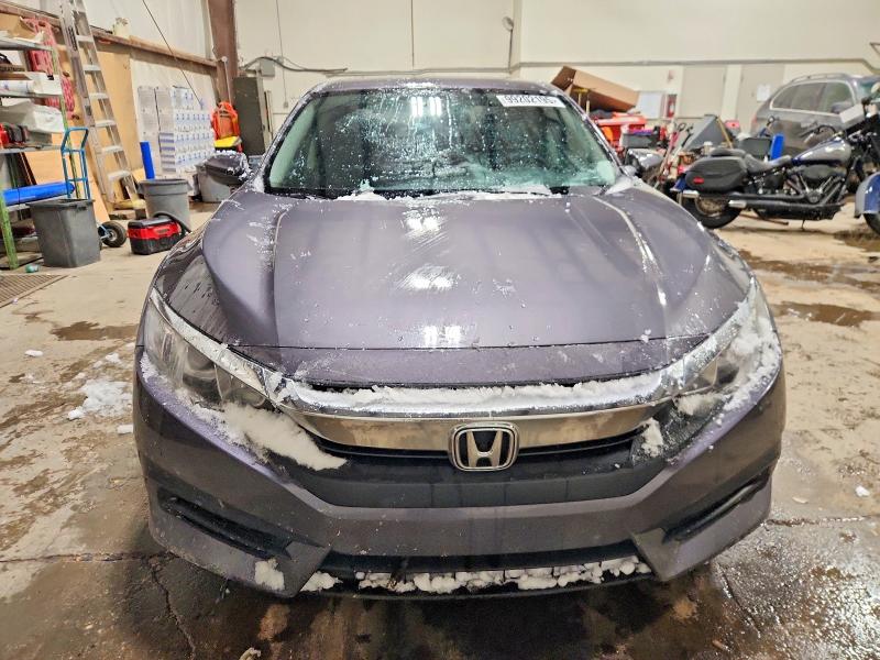 Photo 5 from auction – 2018 HONDA CIVIC LX with VIN 2HGFC2F55JH021988