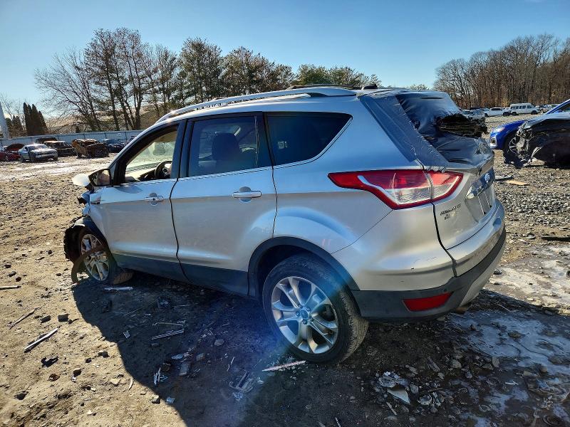 Photo 2 from auction – 2014 FORD ESCAPE TIT with VIN 1FMCU9J98EUB75210