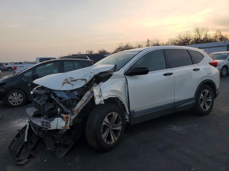 HONDA CR-V LX 2018 with VIN 2HKRW5H3XJH413629 - Photo from auction