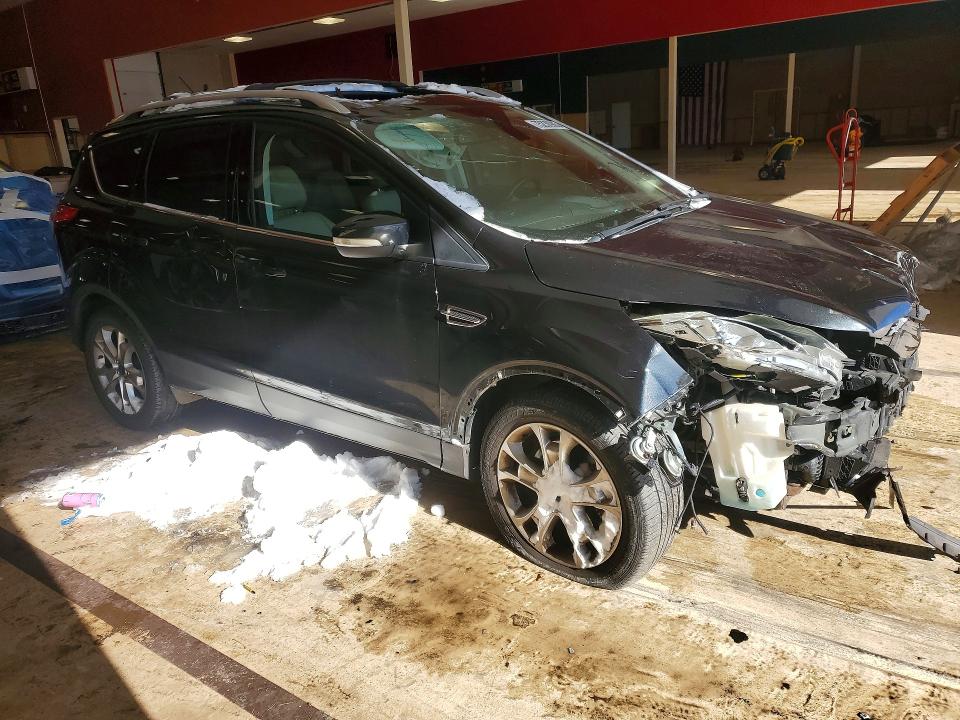 Photo 4 from auction – 2015 FORD ESCAPE with VIN 1FMCU9JXXFUB67559