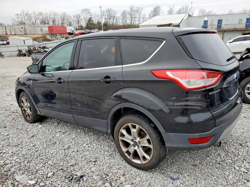 Photo 2 from auction – 2013 FORD ESCAPE SEL with VIN 1FMCU9H97DUC63847