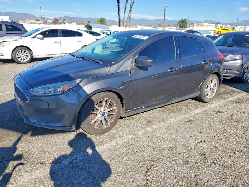 FORD FOCUS SE 2018 with VIN 1FADP3K27JL242318 - Photo from auction