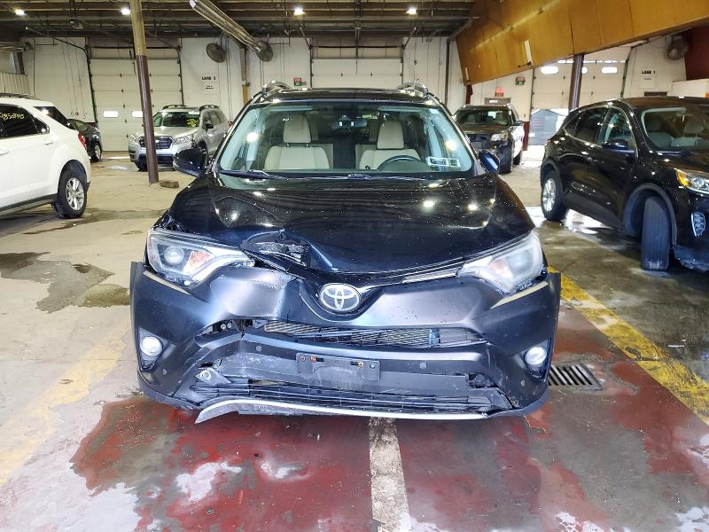 Photo 5 from auction – 2017 TOYOTA RAV4 XLE with VIN 2T3RFREV0HW576225