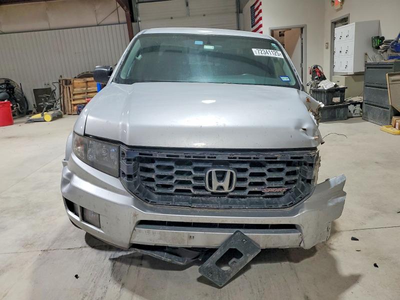 Photo 5 from auction – 2013 HONDA RIDGELINE with VIN 5FPYK1F70DB004099