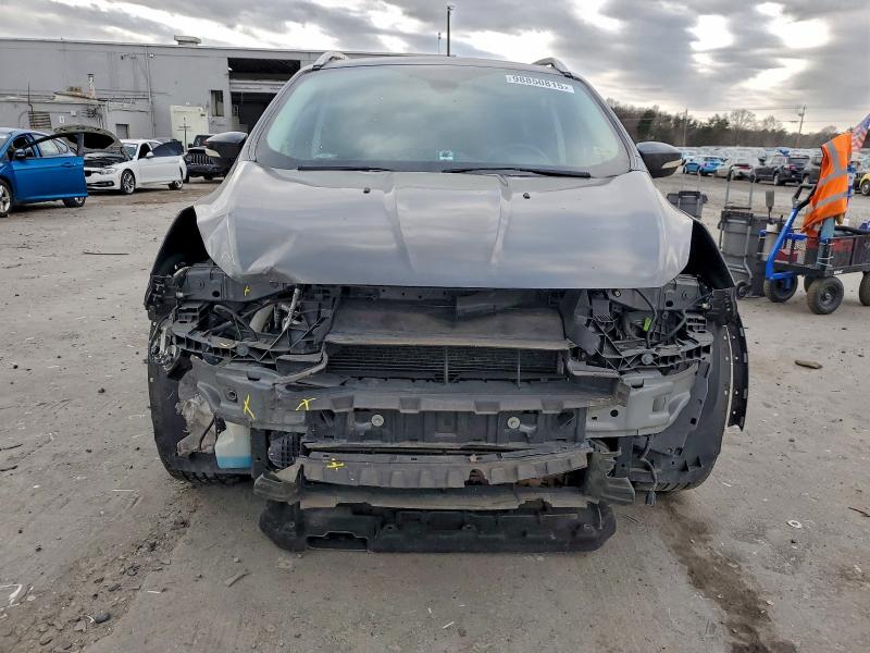 Photo 5 from auction – 2015 FORD ESCAPE TIT with VIN 1FMCU0J9XFUB78574