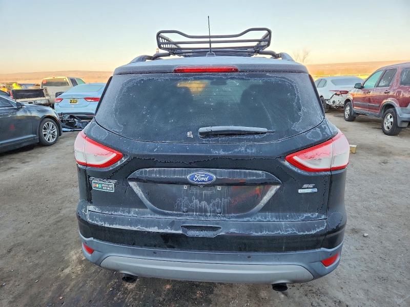 Photo 6 from auction – 2016 FORD ESCAPE SE with VIN 1FMCU9G92GUA98621