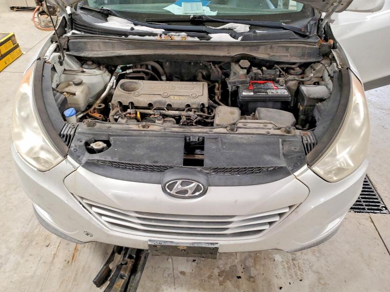 Photo 11 from auction – 2012 HYUNDAI TUCSON GLS with VIN KM8JUCACXCU512957