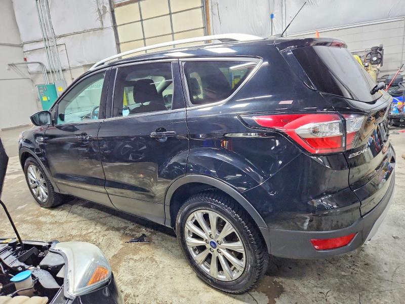 Photo 2 from auction – 2017 FORD ESCAPE TIT with VIN 1FMCU9J98HUE95650