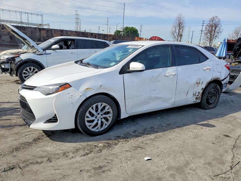 TOYOTA COROLLA 2017 with VIN 5YFBURHE2HP710553 - Photo from auction