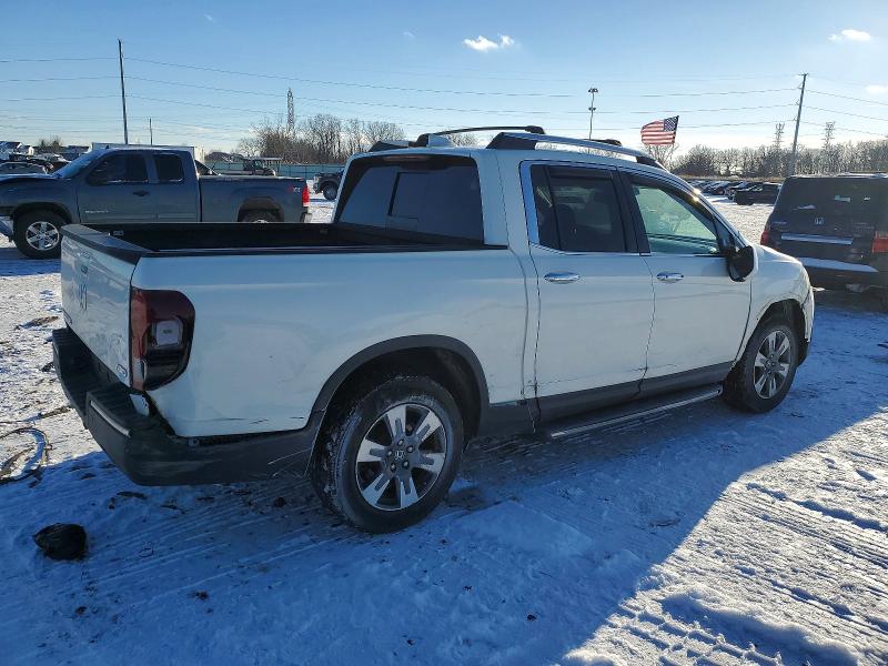 Photo 3 from auction – 2017 HONDA RIDGELINE with VIN 5FPYK3F75HB034555