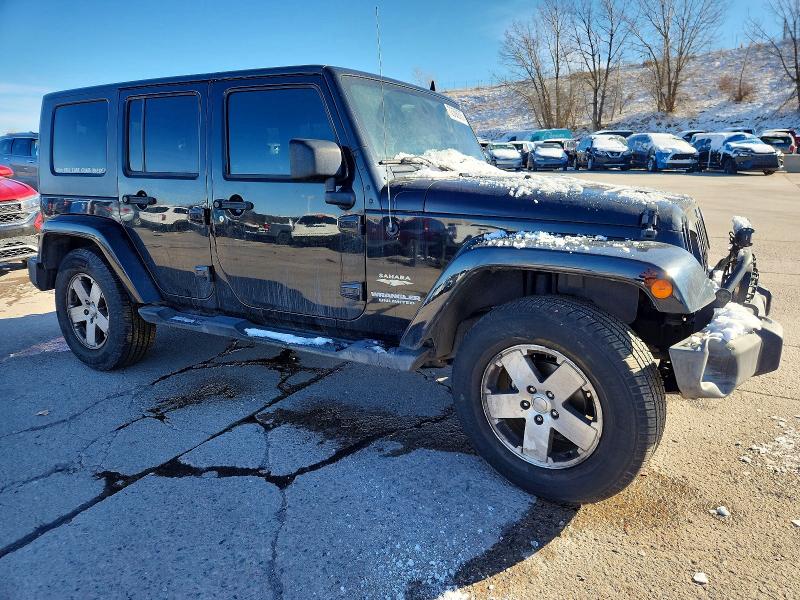 Photo 4 from auction – 2009 JEEP WRANGLER UNLIMITED with VIN 1J8GA59129L701034