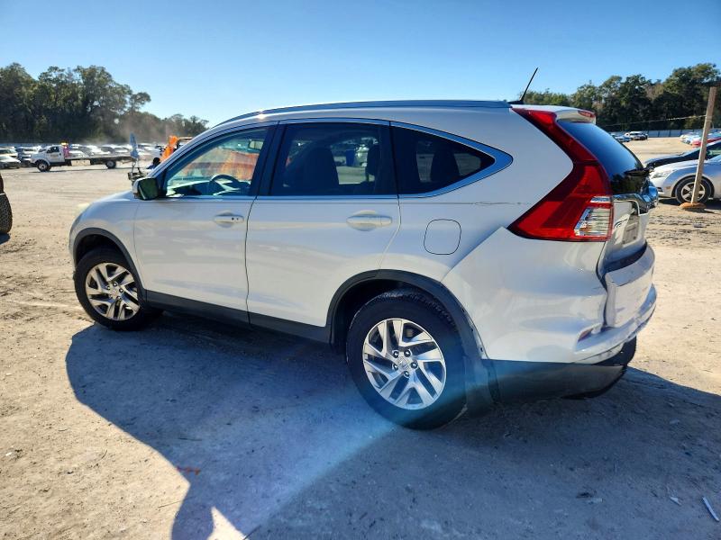 Photo 2 from auction – 2015 HONDA CR-V with VIN 5J6RM3H75FL023886
