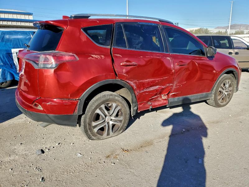 Photo 3 from auction – 2017 TOYOTA RAV4 LE with VIN JTMZFREV3HJ116362