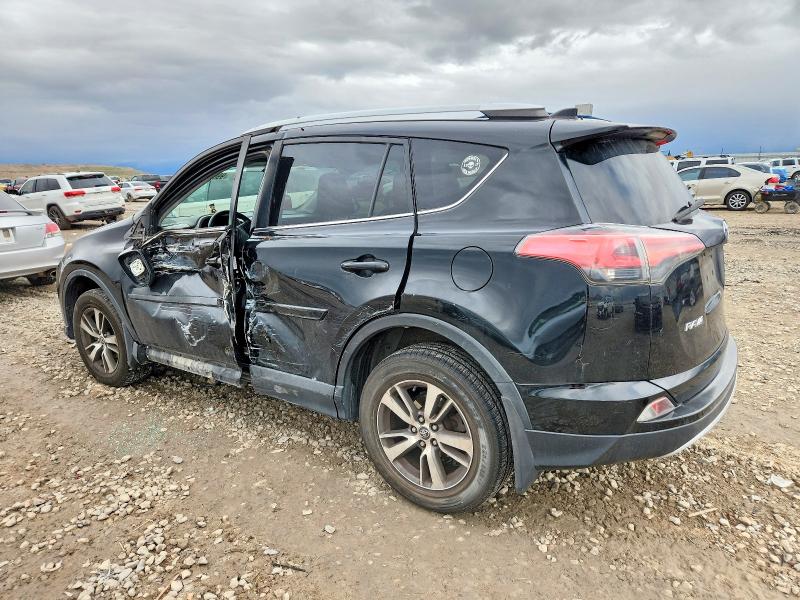 Photo 2 from auction – 2016 TOYOTA RAV4 XLE with VIN 2T3RFREV5GW473378