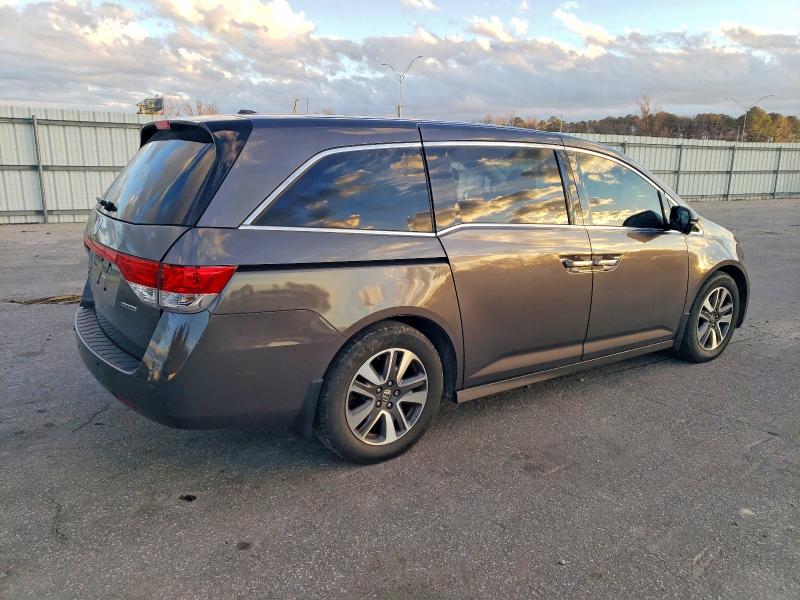 Photo 3 from auction – 2014 HONDA ODYSSEY TO with VIN 5FNRL5H92EB068050