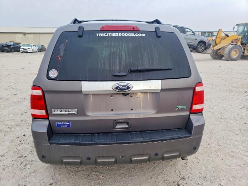 Photo 6 from auction – 2011 FORD ESCAPE LIM with VIN 1FMCU0EG2BKB96954
