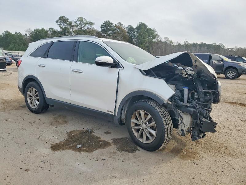 Photo 4 from auction – 2016 KIA SORENTO LX with VIN 5XYPGDA32GG098639