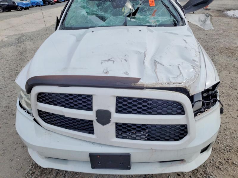Photo 11 from auction – 2014 RAM 1500 with VIN 1C6RR6KT1ES237011