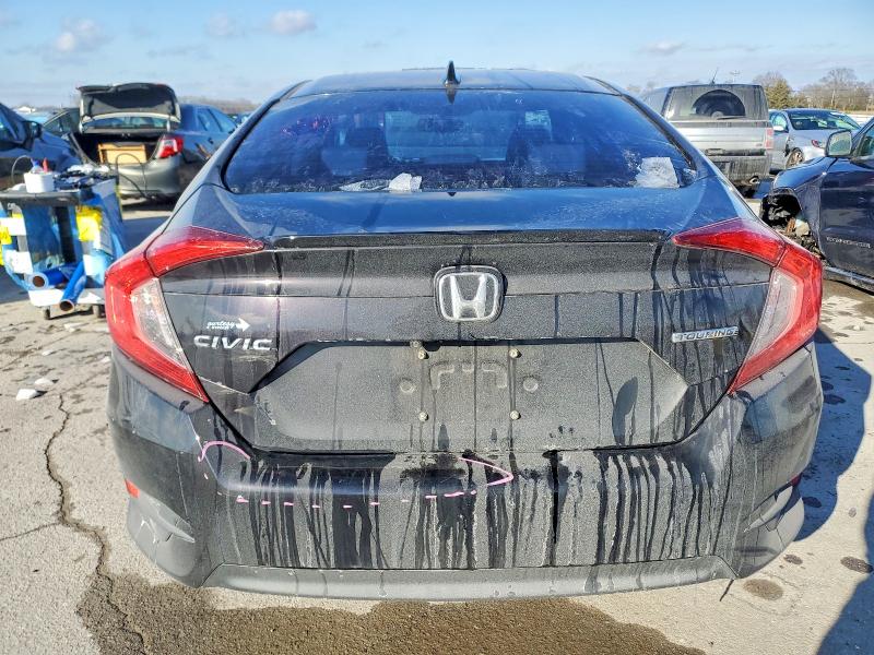 Photo 6 from auction – 2016 HONDA CIVIC TOUR with VIN 19XFC1F94GE010495
