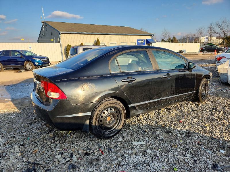 Photo 3 from auction – 2011 HONDA CIVIC LX with VIN 19XFA1F5XBE007340