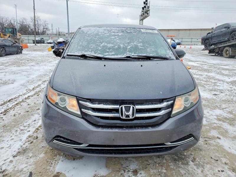 Photo 5 from auction – 2014 HONDA ODYSSEY with VIN 5FNRL5H28EB072719