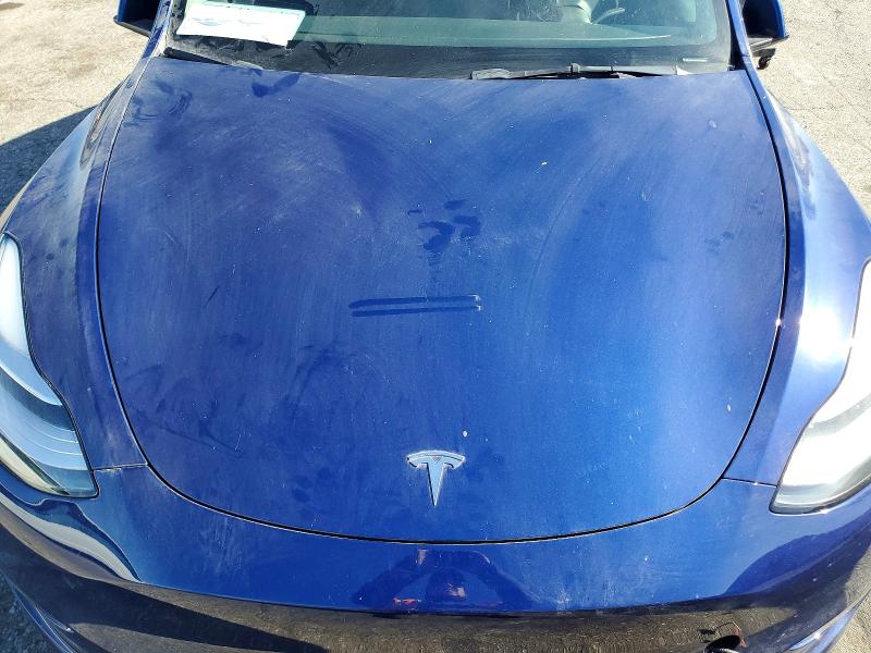 Photo 12 from auction – 2022 TESLA MODEL Y with VIN 7SAYGDEE2NF330146