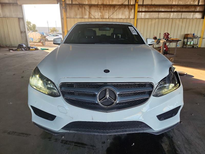 Photo 5 from auction – 2016 MERCEDES-BENZ E with VIN WDDHF5KB4GB290325