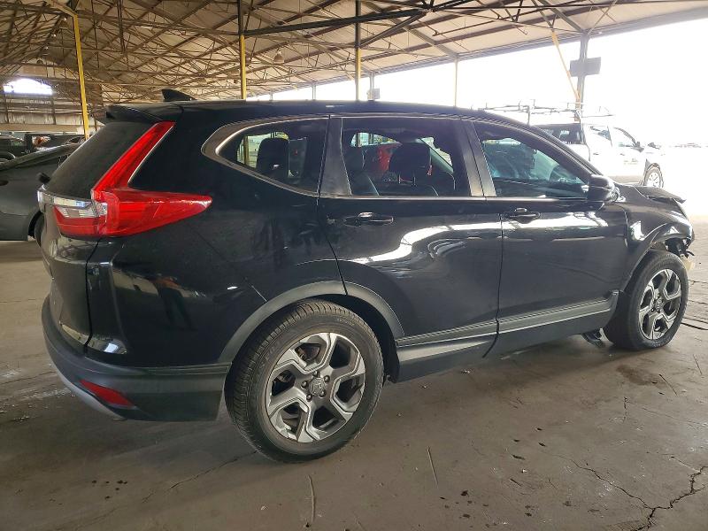 Photo 3 from auction – 2017 HONDA CR-V with VIN 7FARW1H8XHE038682