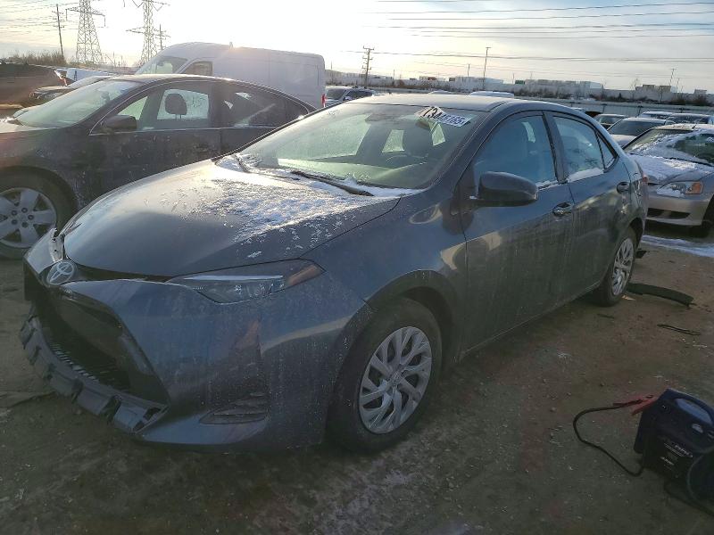 TOYOTA COROLLA L 2019 with VIN 2T1BURHE9KC214477 - Photo from auction