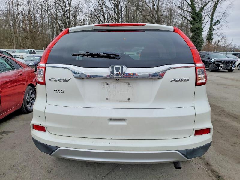 Photo 6 from auction – 2015 HONDA CR-V with VIN 5J6RM4H5XFL035763