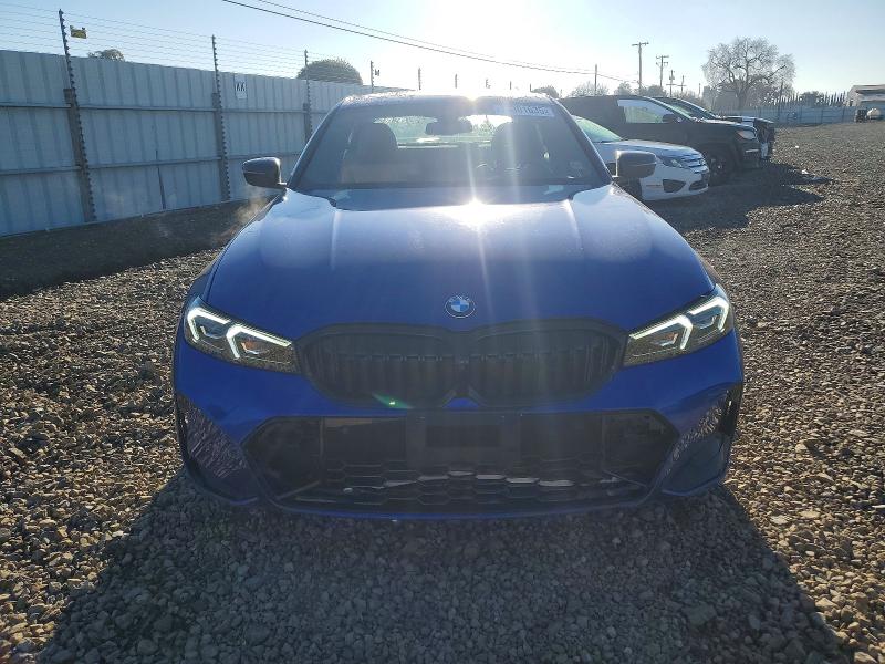 Photo 5 from auction – 2025 BMW 330XI with VIN 3MW89CW09S8E74794