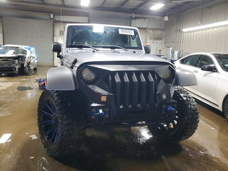 Photo 5 from auction – 2015 JEEP WRANGLER U with VIN 1C4BJWEG4FL674559