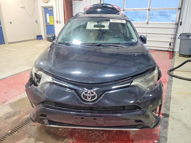 Photo 5 from auction – 2016 TOYOTA RAV4 with VIN 2T3RFREV4GW440064