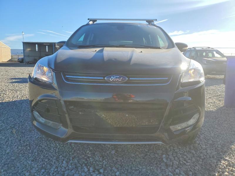 Photo 5 from auction – 2014 FORD ESCAPE with VIN 1FMCU9JX8EUB49639